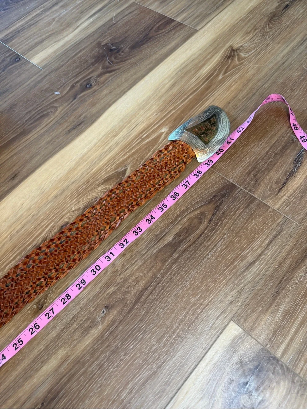 Handwoven Brown Leather Belt with Decorative Silver Buckle